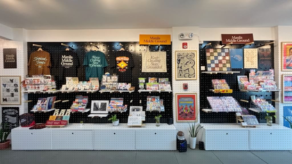 Manila Middle Ground creative retail space with pegboard wall displaying art and merchandise